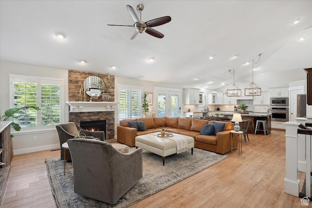 1380 Angel Crest Way, Kaysville, UT 84037 - living room with light wood finished floors, recessed lighting, a fireplace, ceiling fan, and lofted ceiling