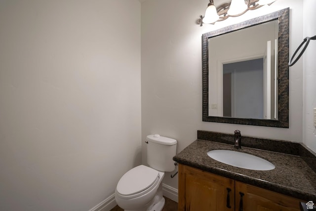 10252 S 3570 W, South Jordan, UT 84095 - half bath featuring toilet, vanity, and baseboards