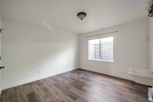 10252 S 3570 W, South Jordan, UT 84095 - spare room with visible vents, baseboards, and dark wood-type flooring
