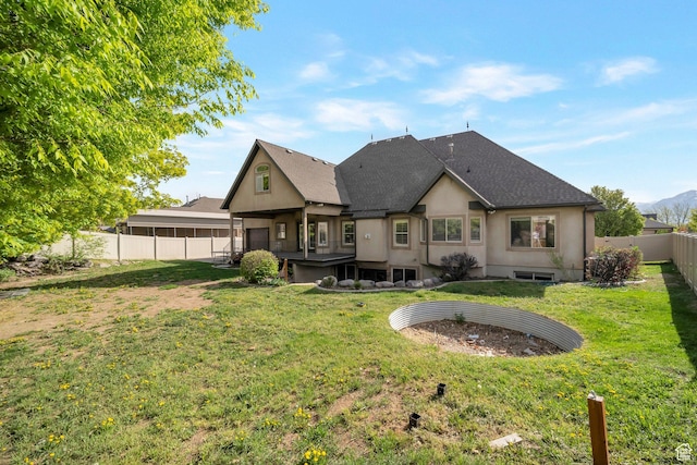 10252 S 3570 W, South Jordan, UT 84095 - back of property with a lawn, a shingled roof, and a fenced backyard