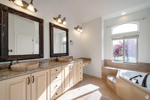 10252 S 3570 W, South Jordan, UT 84095 - bathroom featuring a garden tub, tile patterned flooring, double vanity, and a sink