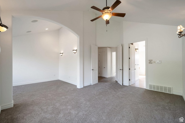 10252 S 3570 W, South Jordan, UT 84095 - empty room featuring arched walkways, carpet floors, ceiling fan, visible vents, and high vaulted ceiling