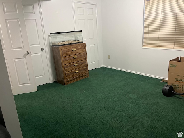 4616 S 3720 W, West Valley City, UT 84120 - unfurnished bedroom with baseboards and dark colored carpet
