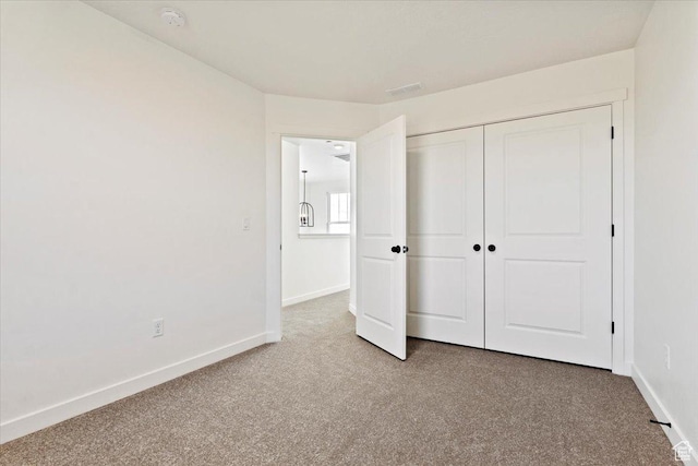 6777 W S Jordan Pkwy, South Jordan, UT 84009 - unfurnished bedroom with a closet, carpet flooring, and baseboards