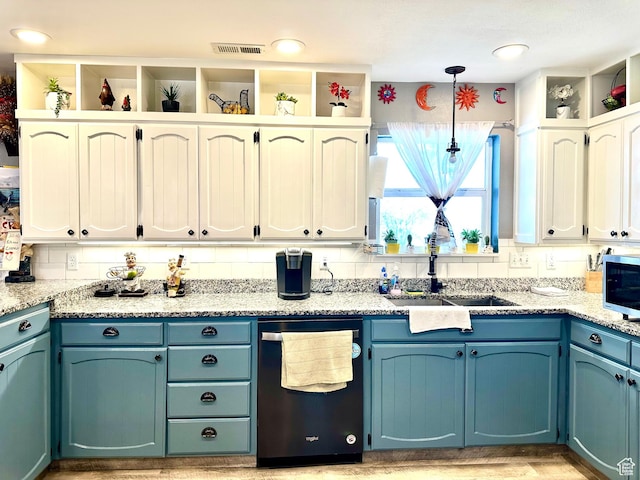 225 S 1400 W, Vernal, UT 84078 - kitchen featuring light stone counters, pendant lighting, a sink, visible vents, and stainless steel appliances