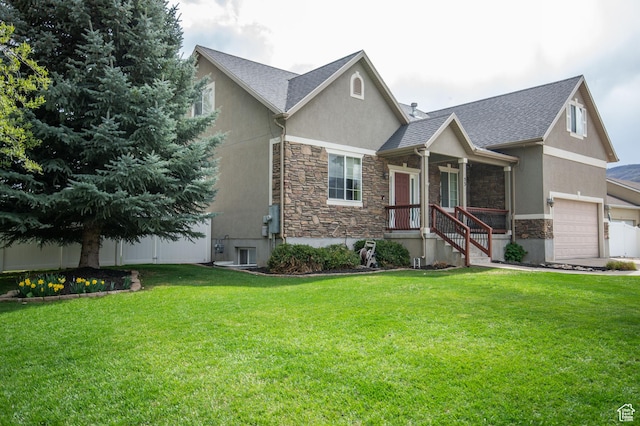53 W 300 S, Midway, UT 84049 - view of front of home featuring a front yard, stucco siding, stone siding, roof with shingles, and an attached garage