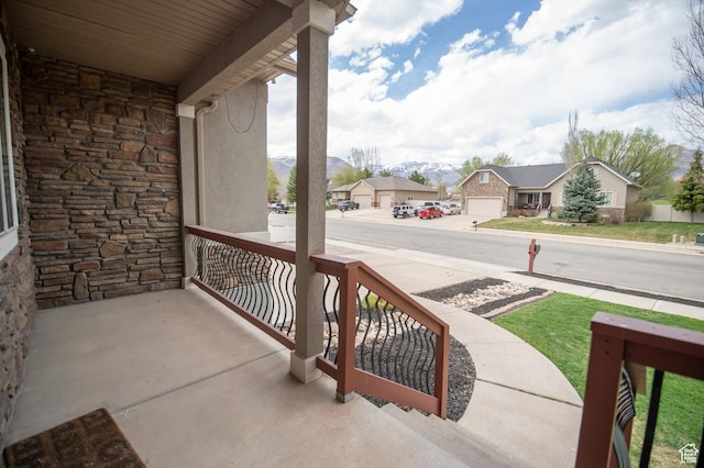 53 W 300 S, Midway, UT 84049 - balcony featuring covered porch and a residential view