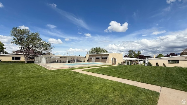 379 W 400 N Unit 7, Bountiful, UT 84010 - rear view of property featuring a patio, a yard, and a fenced in pool