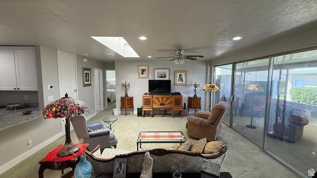 379 W 400 N Unit 7, Bountiful, UT 84010 - carpeted living area with a wealth of natural light, ceiling fan, recessed lighting, and a skylight
