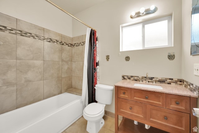 bathroom with decorative backsplash, tile patterned floors, shower / bath combo with shower curtain, toilet, and vanity