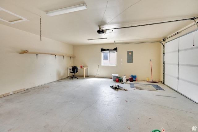 garage featuring a garage door opener and electric panel