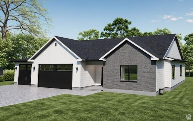 view of front of house with brick siding, a front lawn, decorative driveway, and an attached garage