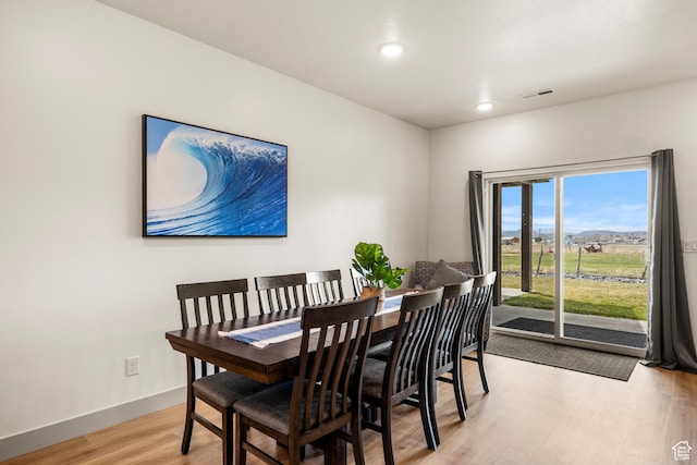 140 W 150 S Unit H29, Garden City, UT 84028 - dining room featuring baseboards, visible vents, light wood-style floors, and recessed lighting
