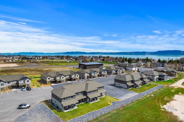 140 W 150 S Unit H29, Garden City, UT 84028 - drone / aerial view with a residential view and a water and mountain view