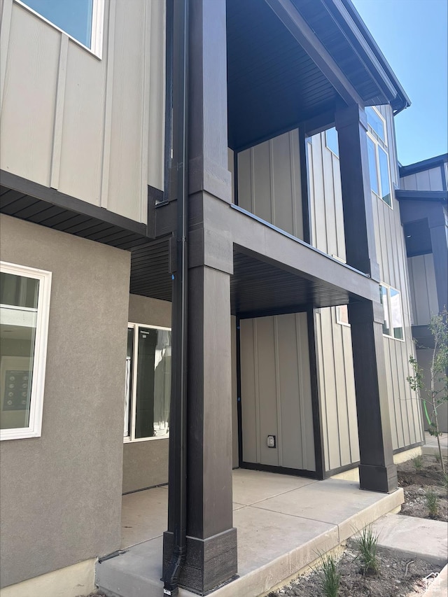view of property exterior with board and batten siding