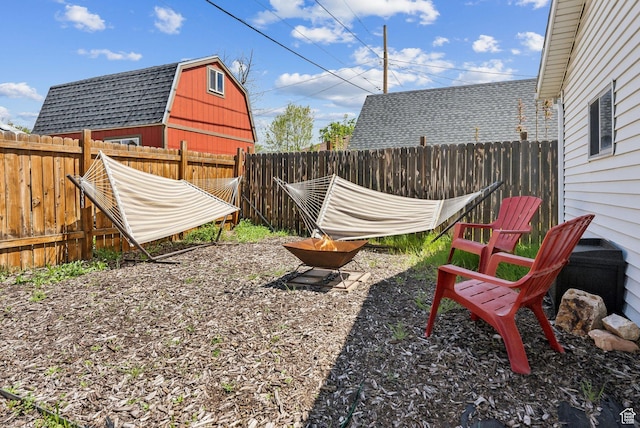 447 E Westminster Ave S, Salt Lake City, UT 84115 - fenced backyard featuring an outdoor fire pit