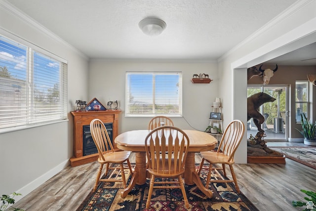 2490 S State St, Springville, UT 84663 - dining room with crown molding, a wealth of natural light, and wood finished floors