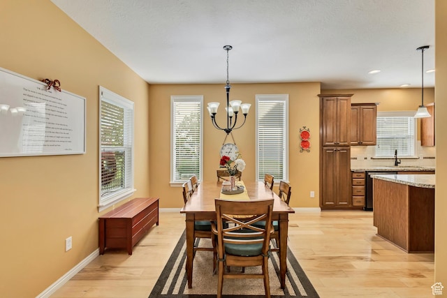 4352 W Degray Dr S, South Jordan, UT 84009 - dining area with light wood-type flooring, recessed lighting, a notable chandelier, and baseboards