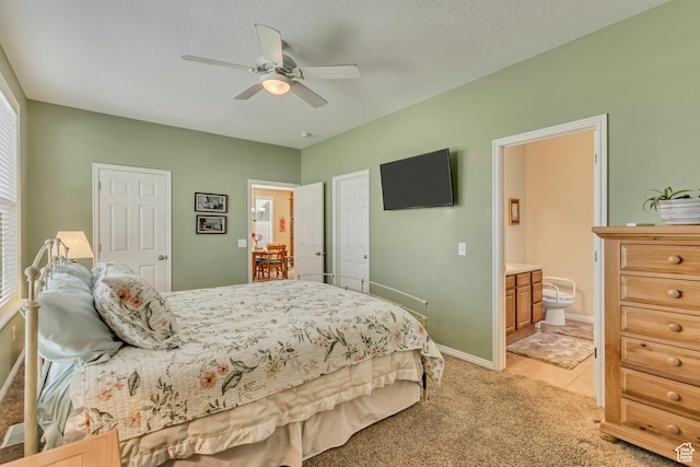 4352 W Degray Dr S, South Jordan, UT 84009 - bedroom featuring baseboards, ensuite bath, a ceiling fan, and light carpet