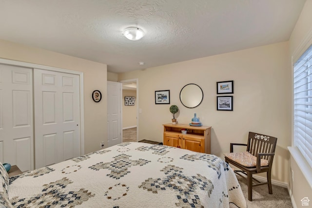 4352 W Degray Dr S, South Jordan, UT 84009 - bedroom with a closet, a textured ceiling, carpet, and baseboards