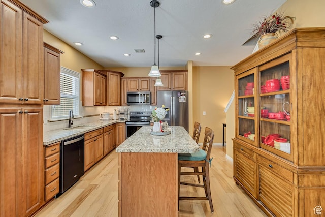 4352 W Degray Dr S, South Jordan, UT 84009 - kitchen with recessed lighting, stainless steel appliances, a kitchen island, and a sink