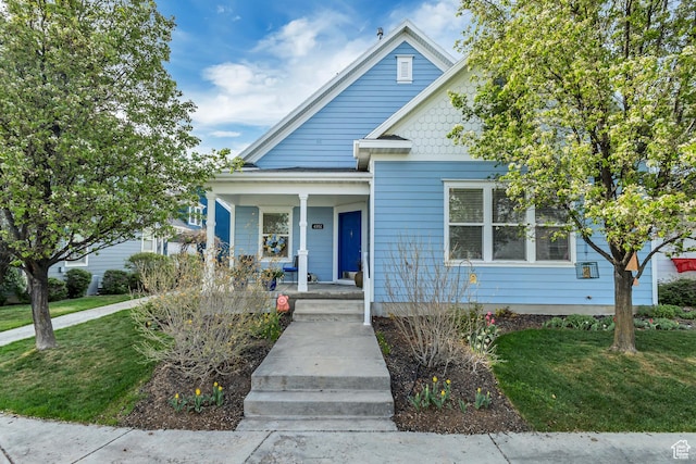 4352 W Degray Dr S, South Jordan, UT 84009 - bungalow-style house featuring a porch and a front lawn