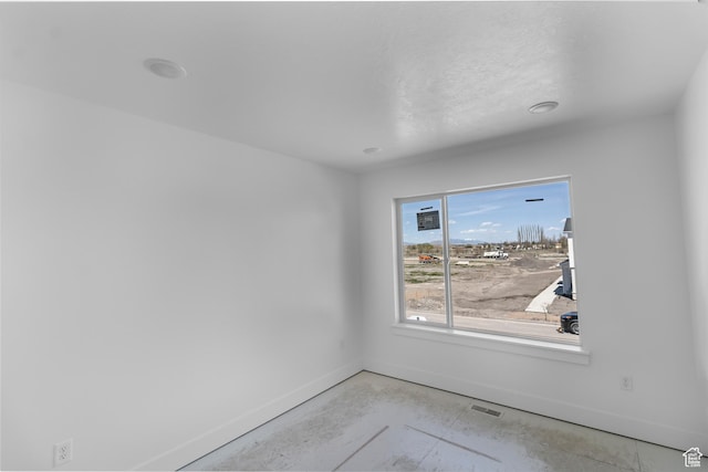1232 W 575 S, Logan, UT 84321 - empty room featuring baseboards, visible vents, and concrete floors