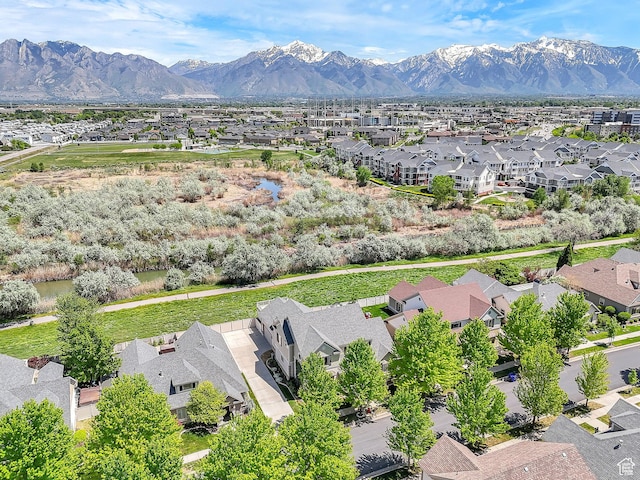 6861 S Triumph Ln, West Jordan, UT 84084 - aerial perspective of suburban area featuring a mountain backdrop