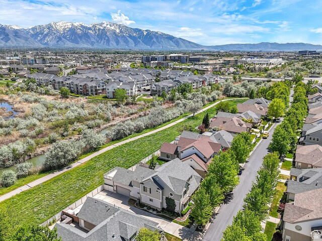 6861 S Triumph Ln, West Jordan, UT 84084 - aerial perspective of suburban area featuring a mountain backdrop