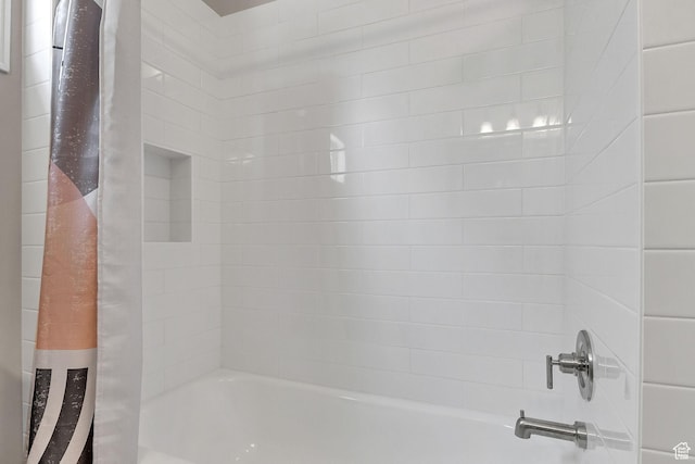 6861 S Triumph Ln, West Jordan, UT 84084 - bathroom featuring shower / bath combination with curtain