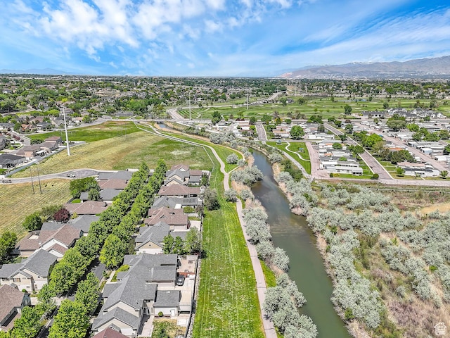 6861 S Triumph Ln, West Jordan, UT 84084 - aerial perspective of suburban area featuring a water and mountain view