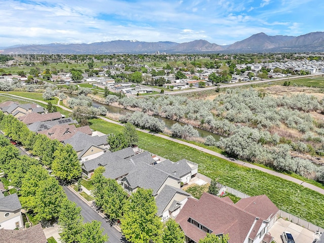 6861 S Triumph Ln, West Jordan, UT 84084 - aerial view of residential area with a mountain backdrop