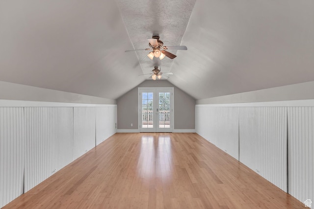 6861 S Triumph Ln, West Jordan, UT 84084 - bonus room with light wood-style flooring, a ceiling fan, and lofted ceiling