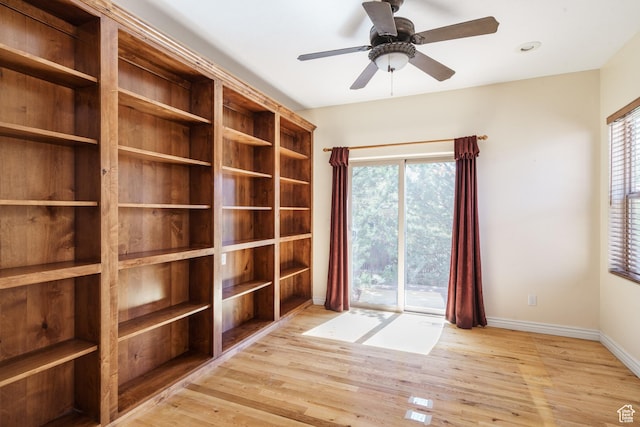 1059 S Ridge Rd, Cedar City, UT 84720 - unfurnished room featuring wood finished floors, ceiling fan, and baseboards