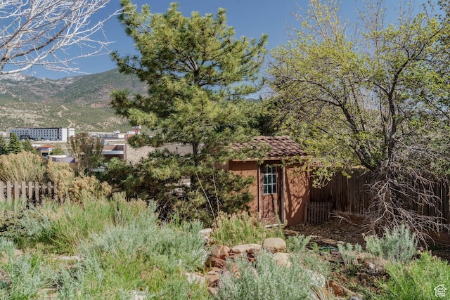 1059 S Ridge Rd, Cedar City, UT 84720 - view of shed with a mountain view and fence