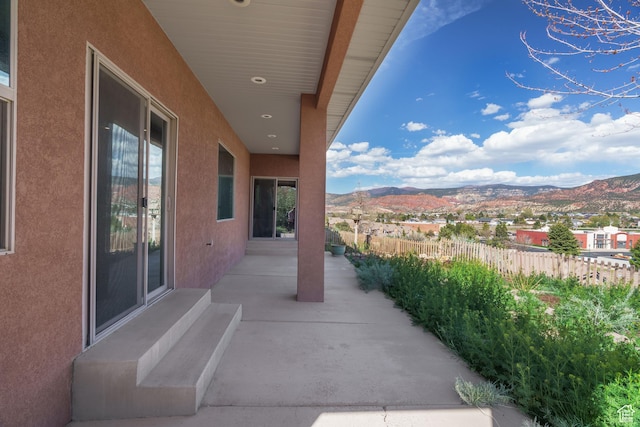 1059 S Ridge Rd, Cedar City, UT 84720 - view of patio featuring a mountain view and fence