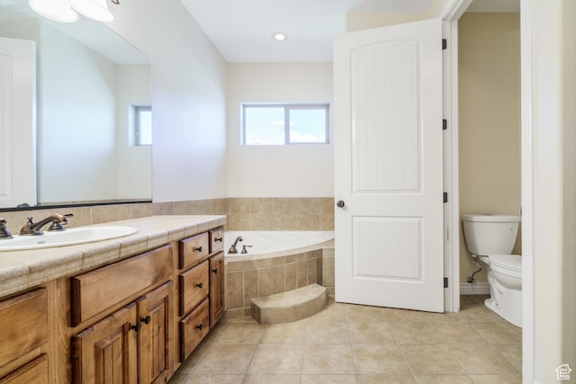 1059 S Ridge Rd, Cedar City, UT 84720 - bathroom featuring toilet, a bath, tile patterned flooring, and vanity
