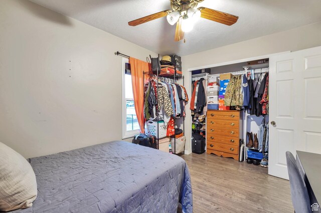 748 Maple St, Ogden, UT 84403 - bedroom with wood finished floors, ceiling fan, and a closet