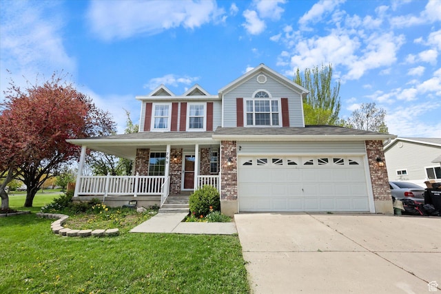 799 Country Club Dr, Stansbury Park, UT 84074 - traditional home featuring concrete driveway, a front yard, covered porch, and brick siding