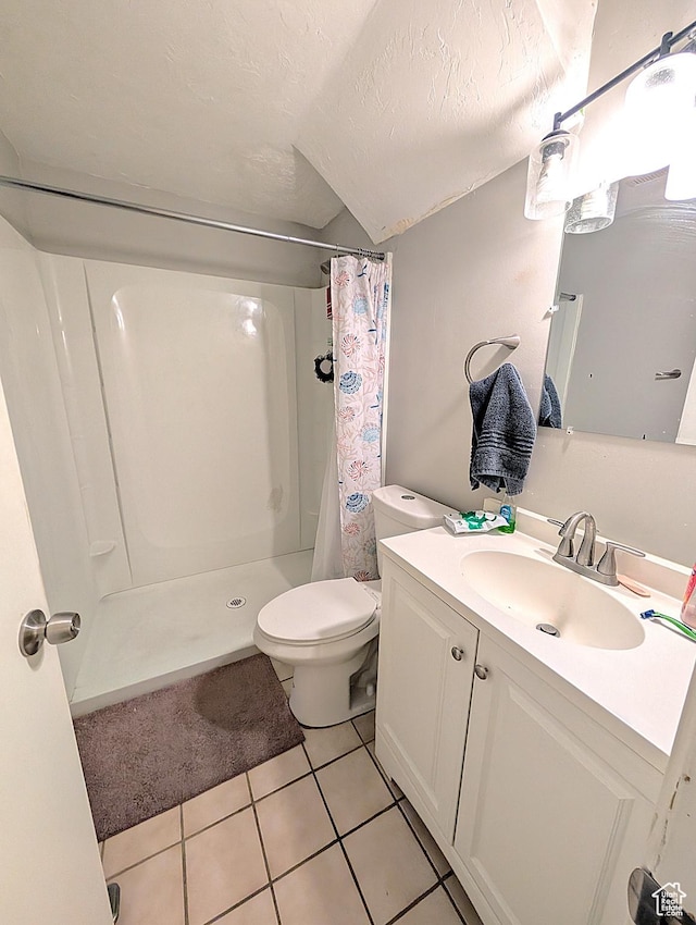 4635 W Eskesen Dr S, West Valley City, UT 84120 - full bathroom featuring a shower stall, vanity, tile patterned floors, toilet, and a textured ceiling