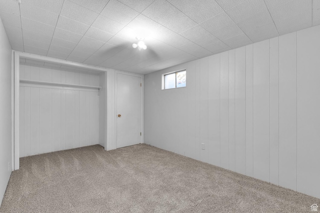 below grade area with carpet flooring
