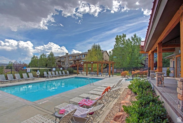 5519 N Lillehammer Ln Unit 1201, Park City, UT 84098 - pool with fence, a pergola, and a patio area