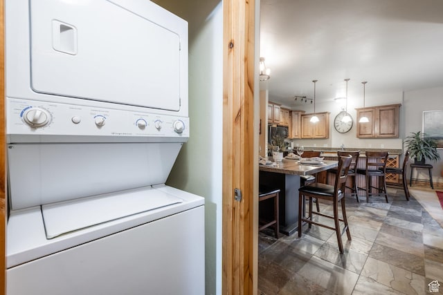 5519 N Lillehammer Ln Unit 1201, Park City, UT 84098 - laundry room with stacked washer and dryer and laundry area