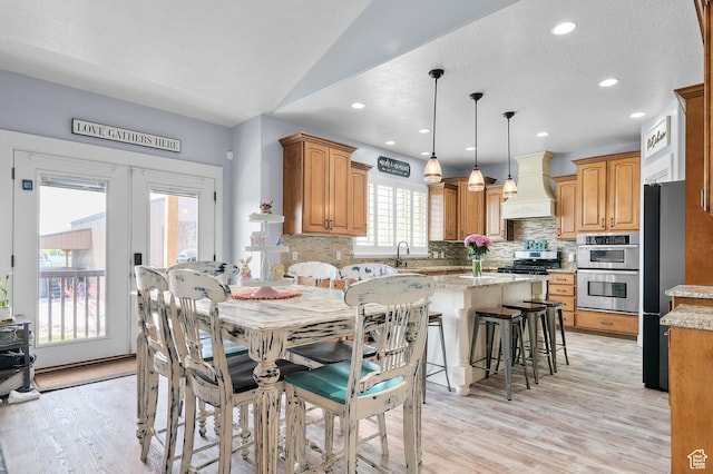 2277 W 900 N, Lehi, UT 84043 - dining area featuring lofted ceiling, french doors, recessed lighting, and light wood-style flooring