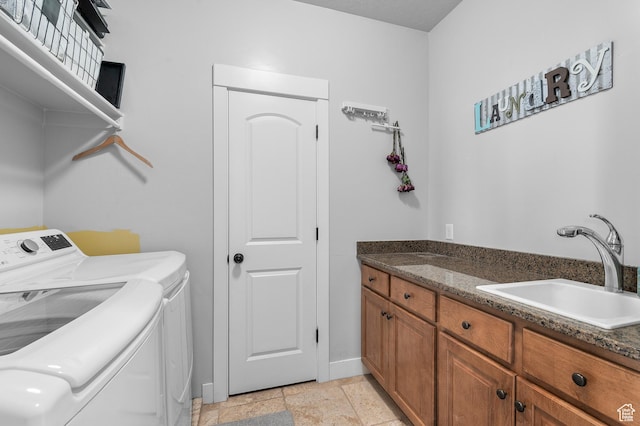 2277 W 900 N, Lehi, UT 84043 - laundry area with stone tile flooring, washing machine and dryer, baseboards, and a sink