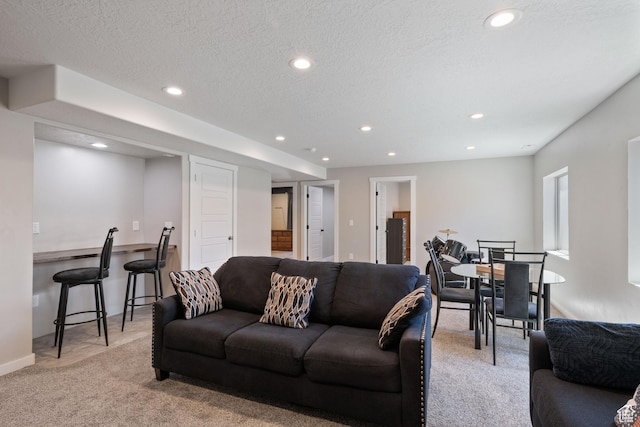 1013 W 90 S, Spanish Fork, UT 84660 - living area featuring light carpet, recessed lighting, and a textured ceiling