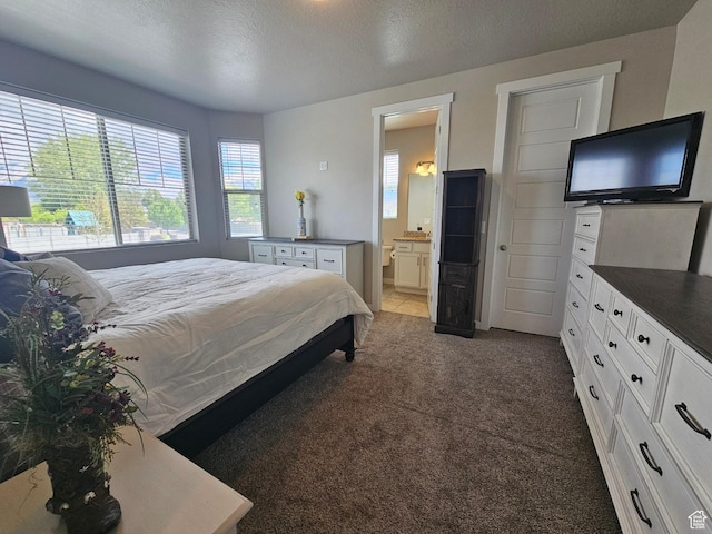 1013 W 90 S, Spanish Fork, UT 84660 - carpeted bedroom with a textured ceiling and connected bathroom