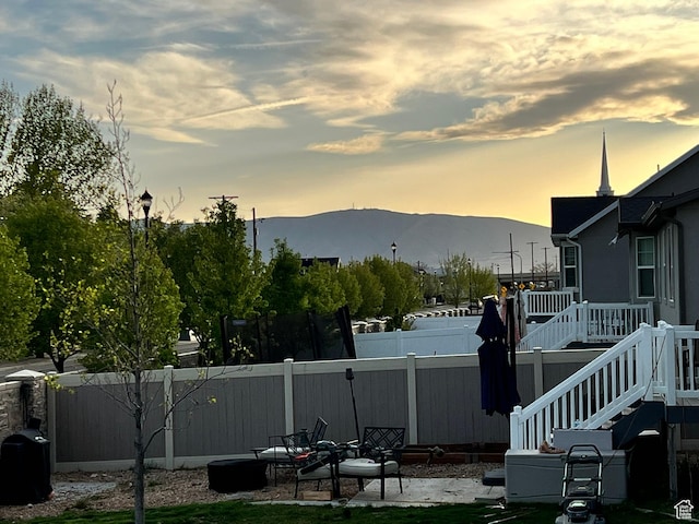 1013 W 90 S, Spanish Fork, UT 84660 - fenced backyard featuring a deck with mountain view and stairs