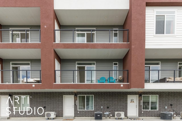 442 E Depot St Unit 107, Clearfield, UT 84015 - view of building exterior featuring central AC and ac unit