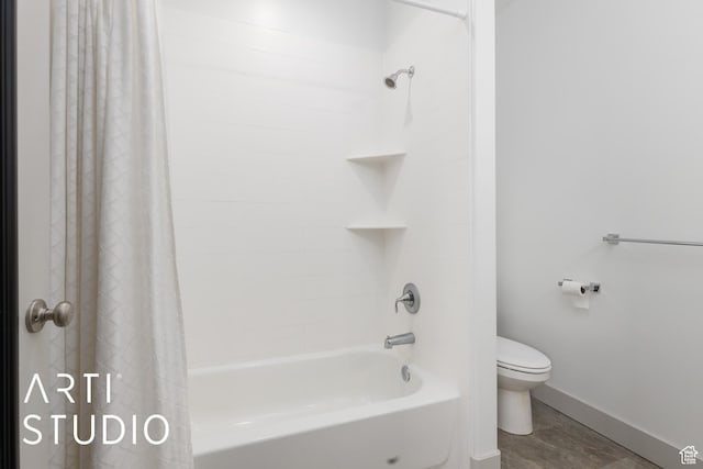 442 E Depot St Unit 107, Clearfield, UT 84015 - bathroom featuring shower / bathtub combination with curtain, toilet, and baseboards